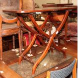 A 19th Century mahogany coaching table with plate glass protector, 17" x 34"