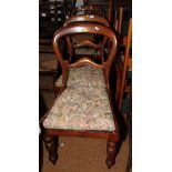 A set of 6 Victorian walnut dining chairs with looped backs and stuffed over seats, on shaped