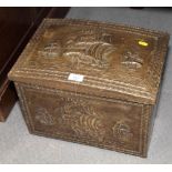 An embossed brass covered slipper box decorated galleons