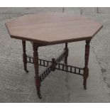 A late 19th Century walnut octagonal occasional table, on spindle decorated cross stretchers, 38"