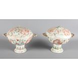 A pair of Chinese porcelain twin-handled pedestal bowls and covers, decorated dragons and foliage, 5