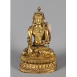 A Chinese gilt bronze Buddha, 8" high