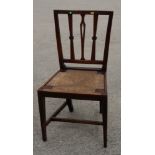 A 19th Century elm standard chair with three splats to back and drop-in rush seat