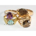 Two 9ct gold stone set dress rings, an 18ct gold stone set dress ring and a 9ct gold signet ring