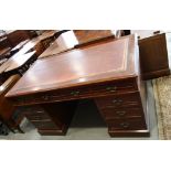 A Georgian design mahogany twin pedestal desk with tooled leather inset top, 54" wide