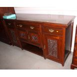 A Maples late 19th Century walnut sideboard, fitted three drawers and three cupboards enclosed