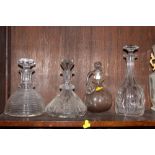 Two 19th Century cut glass ships decanters and two other decanters