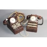 Two French exchange telephones, in brown plastic cases