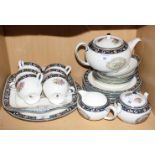 A Wedgewood "Runnymede" porcelain teaset comprising teapot, sugar and cream, six cups, five saucers,