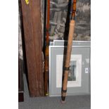 A three-section cane fishing rod by G Little & Co with spare tip canvas case and wooden box and a