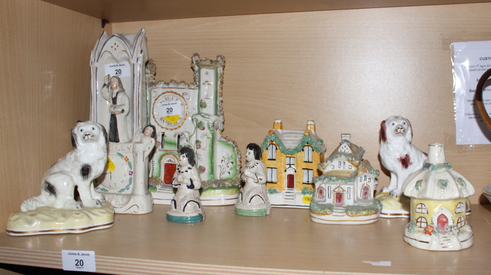 Nine Staffordshire models, including a pair of spaniels and cottages