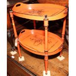 An orange and black decorated two-tier etagere with removable trays, 19" wide