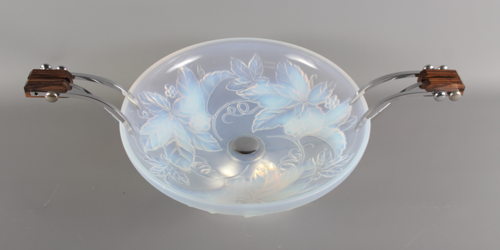 An Art Deco Julien France opalescent glass bowl decorated foliate motifs with chrome stand and
