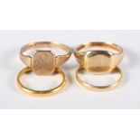 Two 9ct gold signet rings, 7g, an 18ct gold wedding band, 1.7g, and a 22ct gold wedding ring, 3.4g
