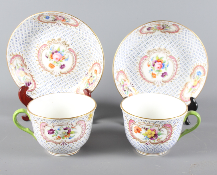 Two 19th Century hand-painted Coalport cups and saucers