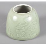 A Chinese porcelain Celadon glazed brush pot decorated clouds with six character Guangxu mark to