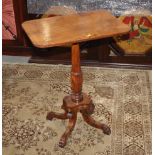 A late Regency rectangular rosewood banded occasional table, on vase pillar and brass inlaid