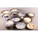 A Bavarian porcelain dessert service, including four tazzas and dessert plates, a French dessert