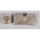 A silver calling card sleeve with engraved decoration and a silver sovereign case