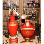 Two red and gilt classical design table lamps