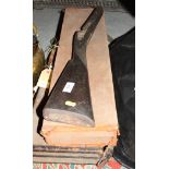 A brown canvas covered shotgun case, maker's label for "W R Leesom Ashford Kent" containing gun