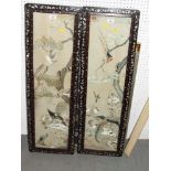 A pair of Chinese embroidered silk panels depicting birds amongst foliage, 37" x 9", a mother-of-