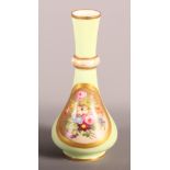 A 19th Century continental porcelain vase with floral decorated panel on a light green ground, 6 1/