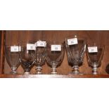 A pair of early 19th Century cut glass goblets and four other similar goblets, various