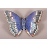 A Beswick model "Purple Emperor" butterfly, 6" wide (one antenna missing)