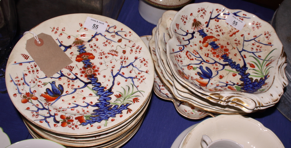 A 19th Century Derby china dessert set decorated in red, blue and gilt, comprising seven dessert