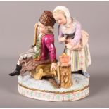 A 19th Century continental porcelain figure group, "Winter", young boy on a sledge with young girl