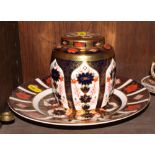 A Royal Crown Derby ginger jar and cover and a matching dessert plate, pattern 1128