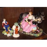 A Capo di Monte china figure, lady with horse (repaired), a Royal Doulton figure, snowman, and two