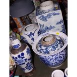 A Chinese blue and white square section vase with landscape decoration, 13" high, a blue and white