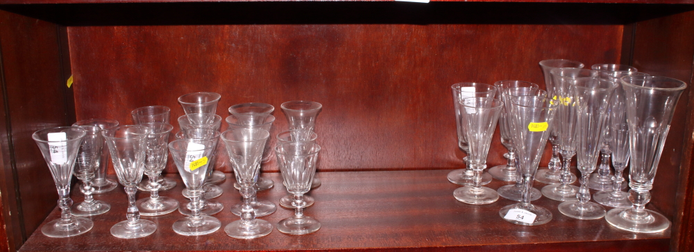 Sixteen assorted 19th Century wine glasses with mainly conical glass bowls and eleven assorted ale