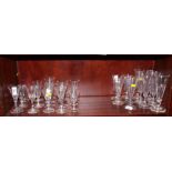 Sixteen assorted 19th Century wine glasses with mainly conical glass bowls and eleven assorted ale