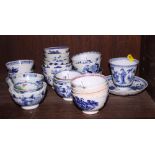 A collection of late 18th Century and early 19th Century tea bowls, various, mostly blue and