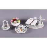 A 19th Century Continental porcelain inkwell, a Continental porcelain posy basket, a Lladro model of
