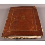 An early 19th Century leather folio containing a collection of hand-coloured 19th Century engravings