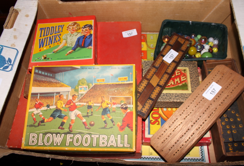 A Peter Pan "blue football" game, a 1930s tiddlywinks set, two cribbage boards and a number of other