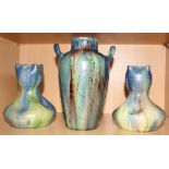 A pair of early 20th Century studio pottery vases decorated blue, brown and green glazes and a