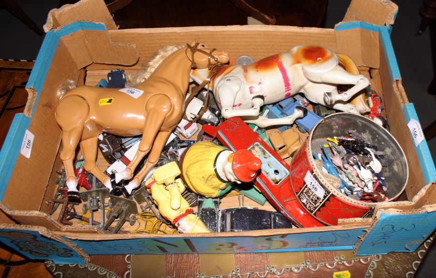 A collection of die-cast vehicles, various, two articulated horses and a number of other toys,