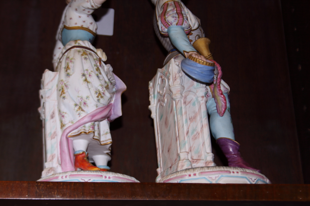 A pair of 19th century Continental polychrome bisque candlesticks, formed as figures in period - Image 11 of 11