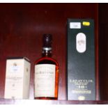 A bottle of Balvenie seventeen year old peated cask single malt whisky, a bottle of Lagavulin