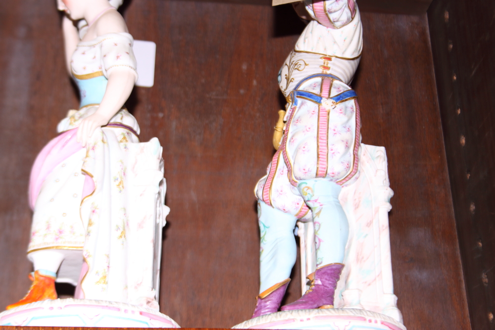 A pair of 19th century Continental polychrome bisque candlesticks, formed as figures in period - Image 7 of 11