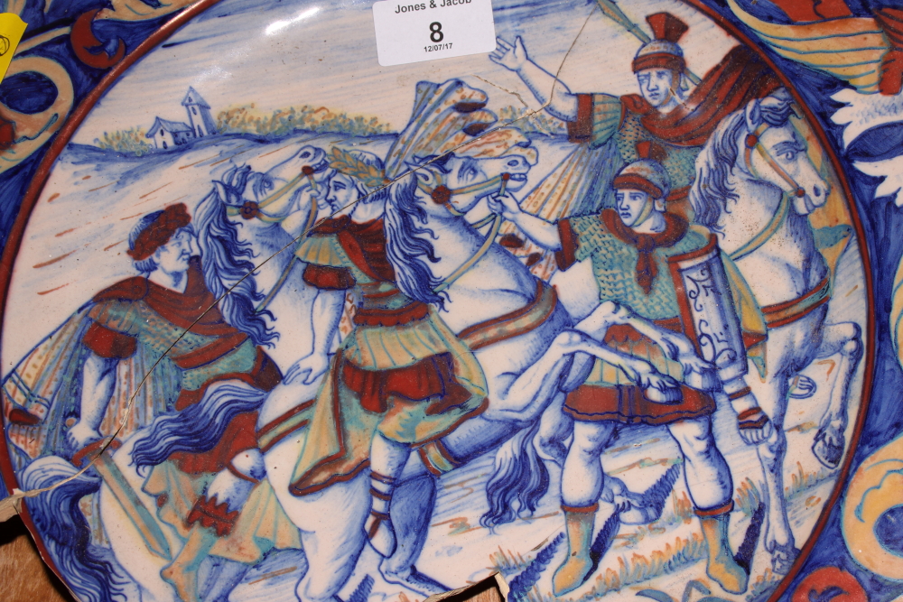 A Gubbio style faience dish, the centre painted Roman soldiers and horses, 15" dia (for restoration) - Image 2 of 3