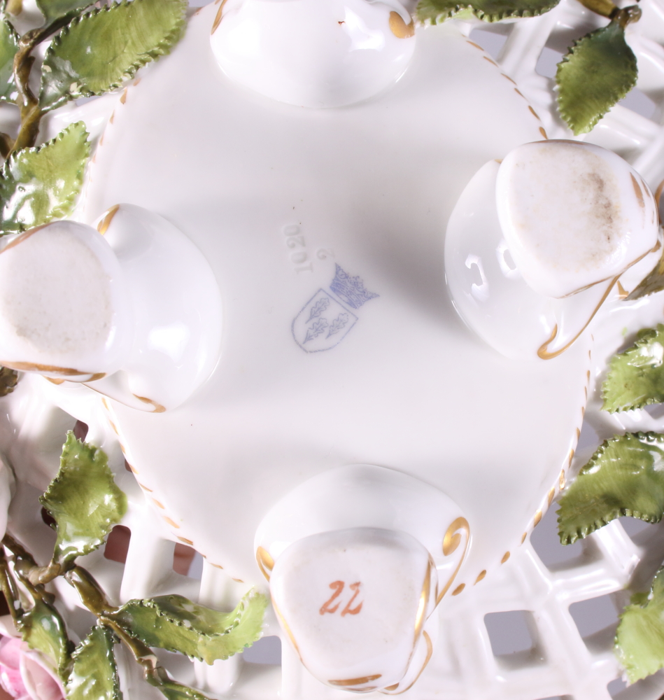 A mid 20th Century Continental porcelain table centre, basket with cherub supports and floral relief - Image 3 of 4