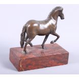 A bronze statue of a San Marco horse, on rouge marble base, 6" high