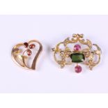 A yellow metal and gem set brooch (a/f) together with a 9ct gold garnet and seed pearl brooch (