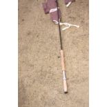 A Kevlar Graphite 12 foot three-section fishing rod, in bag